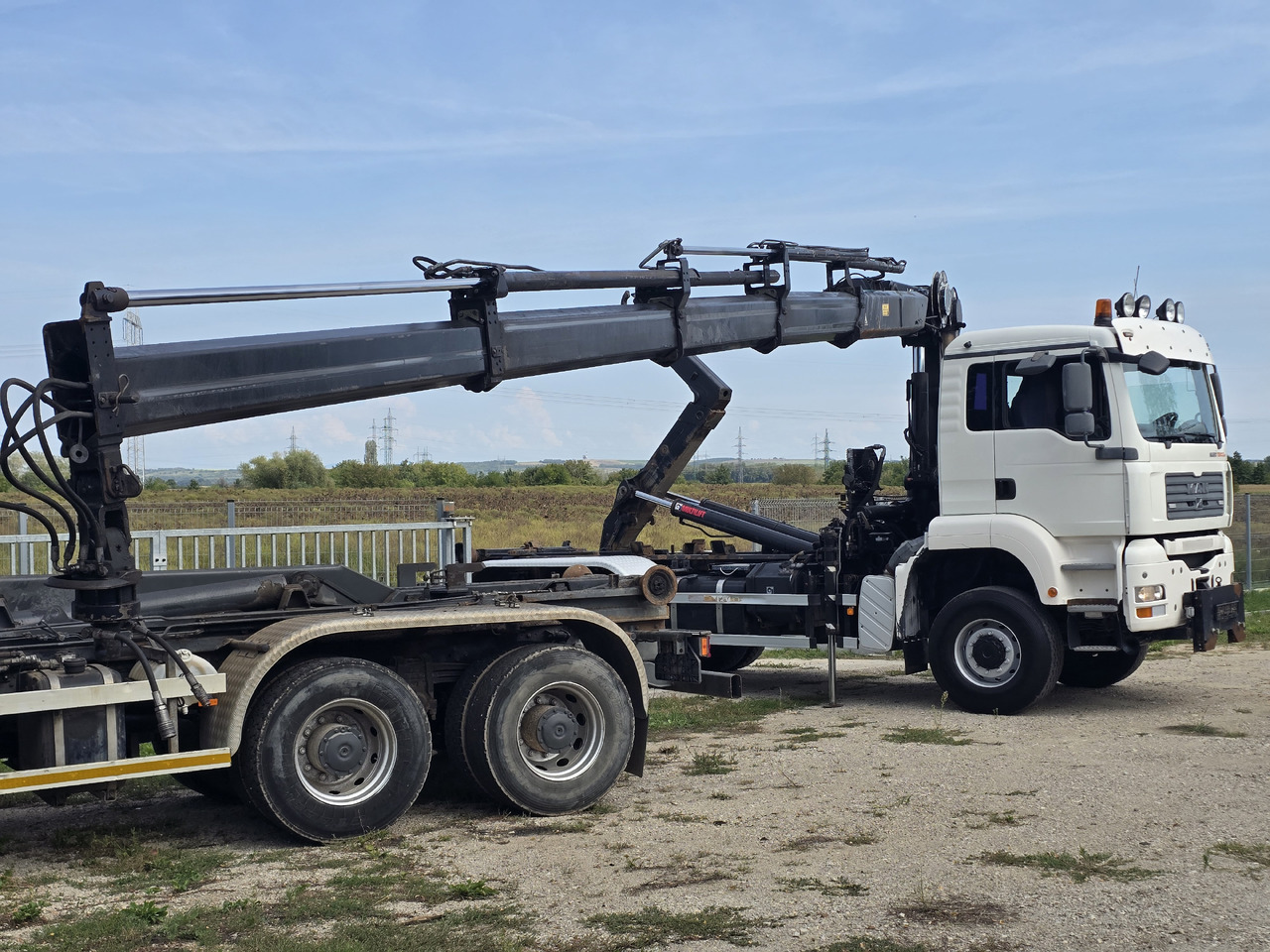 MAN TGA 26.440 6X6 / HOOK SYSTEM / HIAB 166D REMOTE - Hook lift, Truk derek: gambar 4 MAN TGA 26.440 6X6 / HOOK SYSTEM / HIAB 166D REMOTE - Hook lift, Truk derek: gambar 4