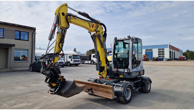 WACKER NEUSON EW65 - Ekskavator roda: gambar 1 WACKER NEUSON EW65 - Ekskavator roda: gambar 1