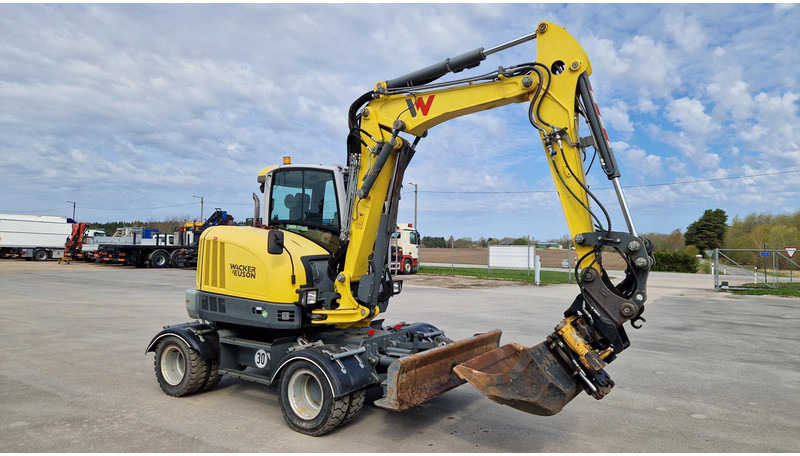 WACKER NEUSON EW65 - Ekskavator roda: gambar 2 WACKER NEUSON EW65 - Ekskavator roda: gambar 2