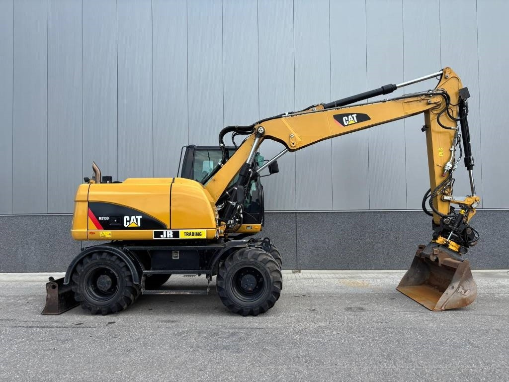 CAT M 313 D  - Ekskavator roda: gambar 5 CAT M 313 D  - Ekskavator roda: gambar 5