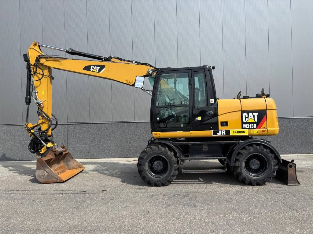 CAT M 313 D  - Ekskavator roda: gambar 1 CAT M 313 D  - Ekskavator roda: gambar 1