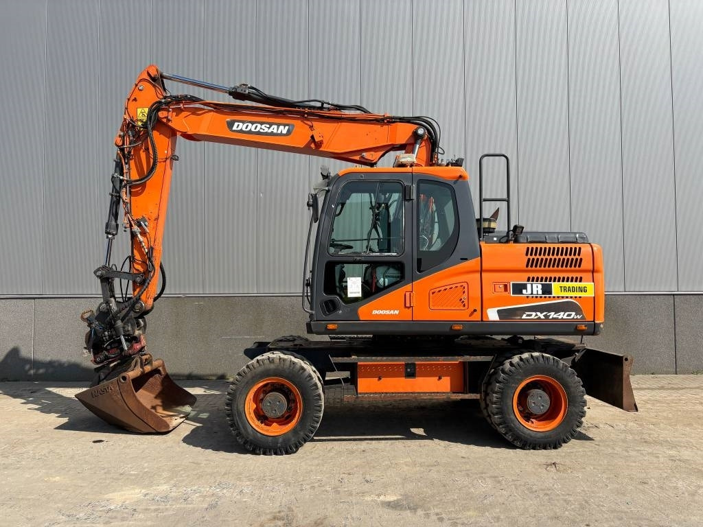 Doosan DX 140 W-5 (R5 Rototilt) - Ekskavator roda: gambar 1 Doosan DX 140 W-5 (R5 Rototilt) - Ekskavator roda: gambar 1