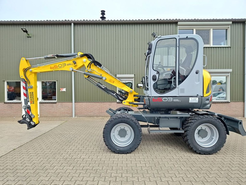 WACKER NEUSON 6503-2 - Ekskavator roda: gambar 1 WACKER NEUSON 6503-2 - Ekskavator roda: gambar 1