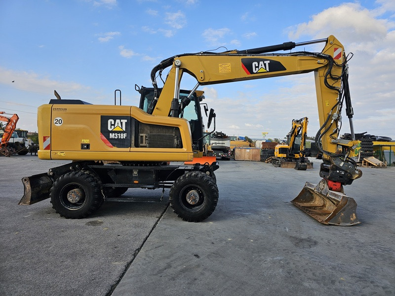 CATERPILLAR M318F - Ekskavator roda: gambar 4 CATERPILLAR M318F - Ekskavator roda: gambar 4