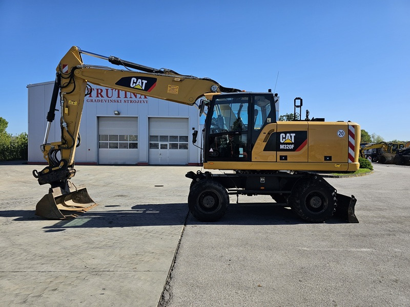 CATERPILLAR M320F - Ekskavator roda: gambar 2 CATERPILLAR M320F - Ekskavator roda: gambar 2