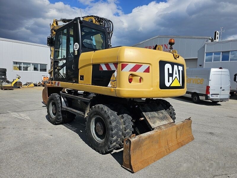 Caterpillar M315D - Ekskavator roda: gambar 2 Caterpillar M315D - Ekskavator roda: gambar 2
