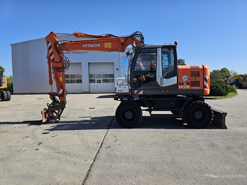 HITACHI ZX145W-3 - Ekskavator roda: gambar 1 HITACHI ZX145W-3 - Ekskavator roda: gambar 1