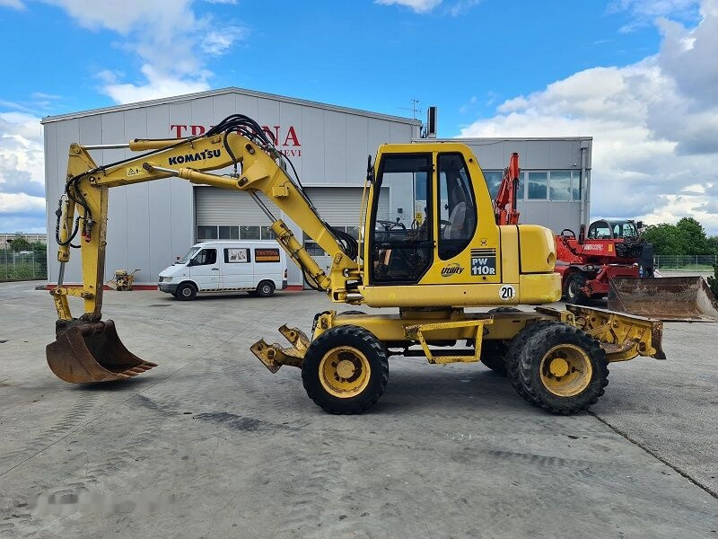 Komatsu PW110 - Ekskavator roda: gambar 1 Komatsu PW110 - Ekskavator roda: gambar 1