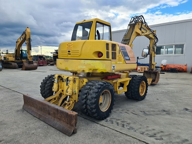 Komatsu PW110 - Ekskavator roda: gambar 4 Komatsu PW110 - Ekskavator roda: gambar 4