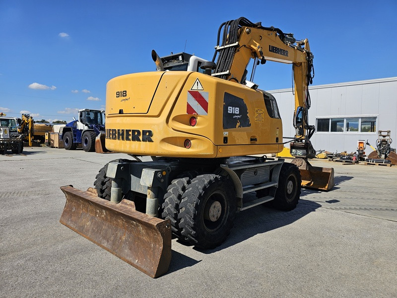LIEBHERR A918 Compact - Ekskavator roda: gambar 3 LIEBHERR A918 Compact - Ekskavator roda: gambar 3