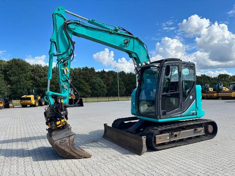 Kobelco SK 75 SR-3E - Ekskavator mini: gambar 1 Kobelco SK 75 SR-3E - Ekskavator mini: gambar 1