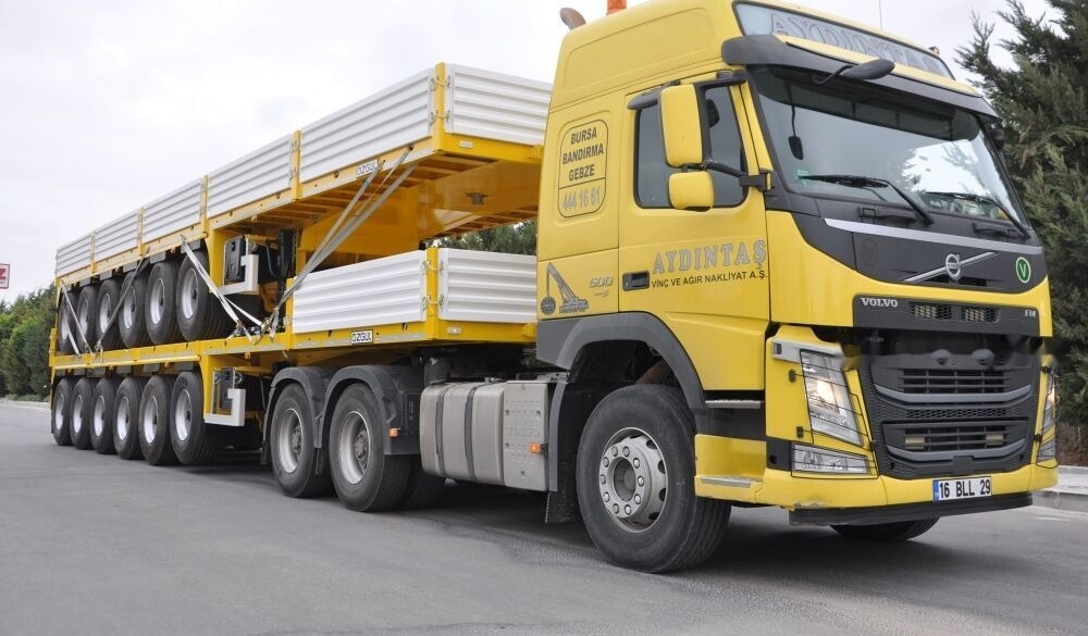 Özgül 6 AXLE PLATFORM SEMI TRAILER - Semi-trailer flatbed: gambar 1 Özgül 6 AXLE PLATFORM SEMI TRAILER - Semi-trailer flatbed: gambar 1