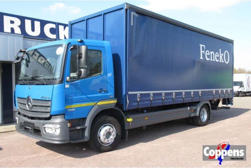 Mercedes-Benz Atego 1318L Euro 6 - Truk dengan terpal samping: gambar 1 Mercedes-Benz Atego 1318L Euro 6 - Truk dengan terpal samping: gambar 1