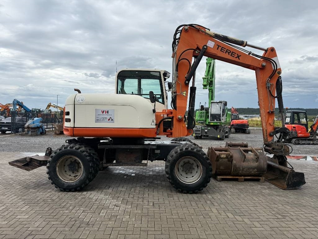 Ekskavator roda Terex TW 110: gambar 6 Ekskavator roda Terex TW 110: gambar 6