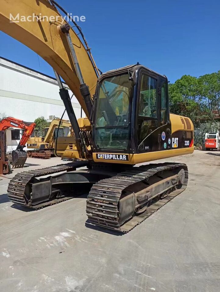 Caterpillar 320D - Ekskavator perayap: gambar 2 Caterpillar 320D - Ekskavator perayap: gambar 2