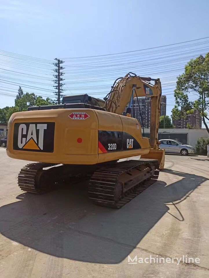 Caterpillar 320D - Ekskavator perayap: gambar 1 Caterpillar 320D - Ekskavator perayap: gambar 1