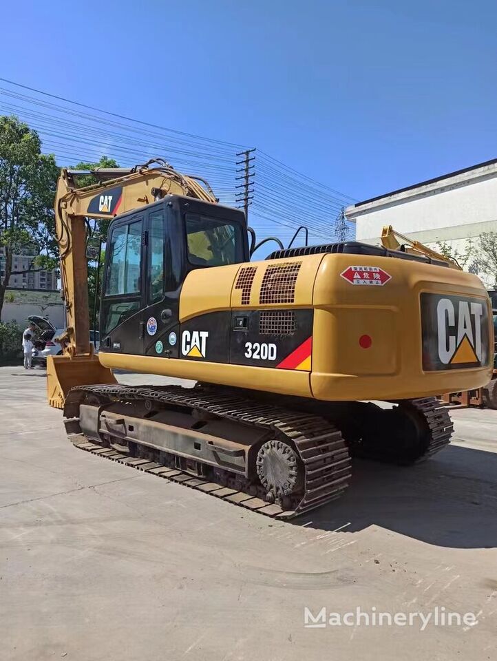 Caterpillar 320D - Ekskavator perayap: gambar 1 Caterpillar 320D - Ekskavator perayap: gambar 1