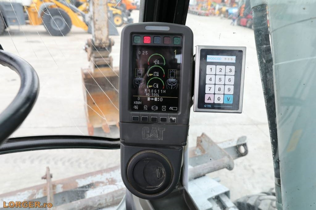 Ekskavator roda CAT M 313 D: gambar 16