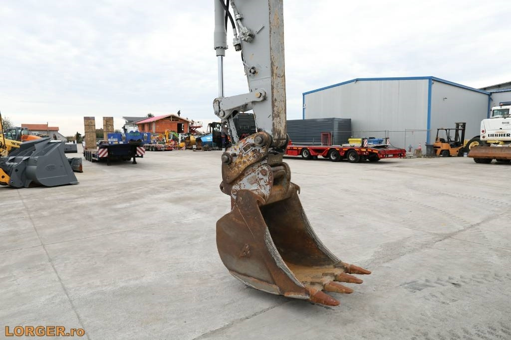 Ekskavator roda CAT M 313 D: gambar 7