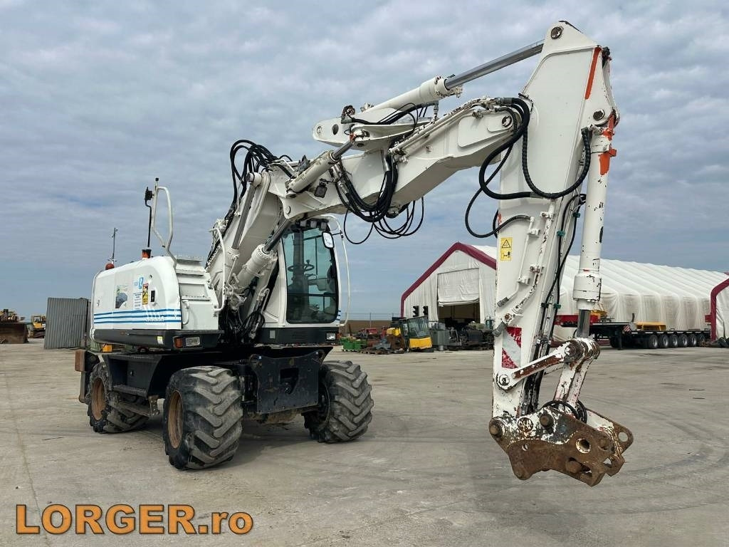Hitachi ZX 140 W-3 - Ekskavator roda: gambar 4 Hitachi ZX 140 W-3 - Ekskavator roda: gambar 4