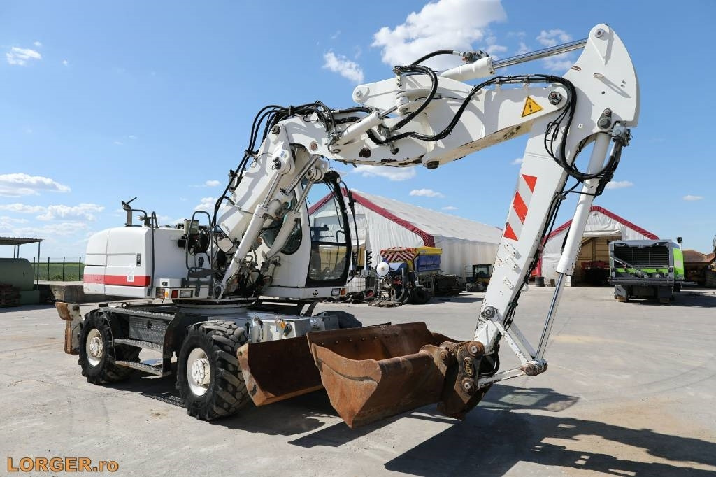 Liebherr A 314 - Ekskavator roda: gambar 4 Liebherr A 314 - Ekskavator roda: gambar 4
