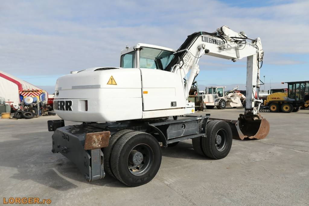 Liebherr A 316 Litronic - Ekskavator roda: gambar 3 Liebherr A 316 Litronic - Ekskavator roda: gambar 3