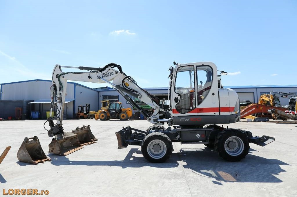 Wacker Neuson EW 100 - Ekskavator roda: gambar 1 Wacker Neuson EW 100 - Ekskavator roda: gambar 1