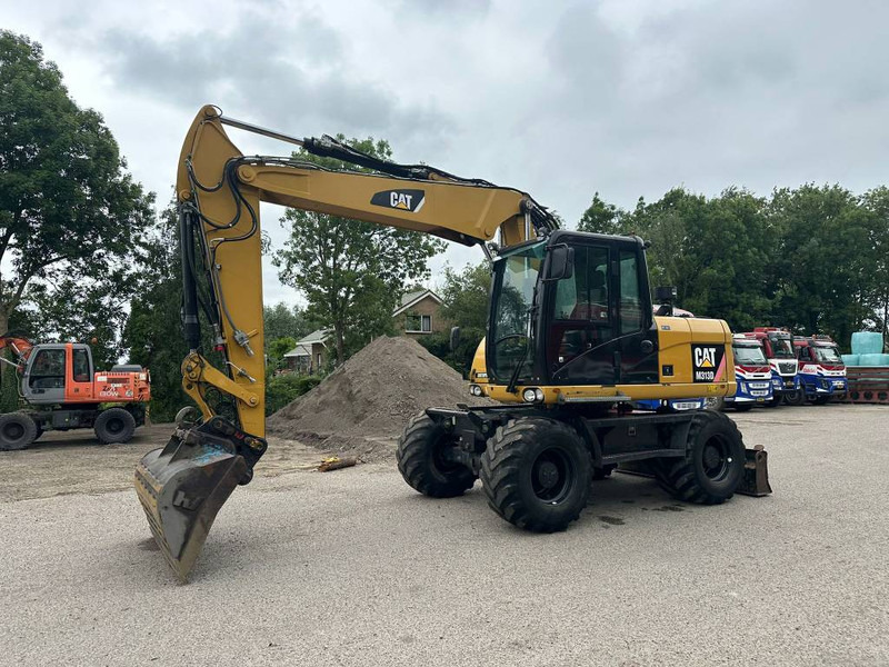Cat M 313 D - Ekskavator roda: gambar 2 Cat M 313 D - Ekskavator roda: gambar 2