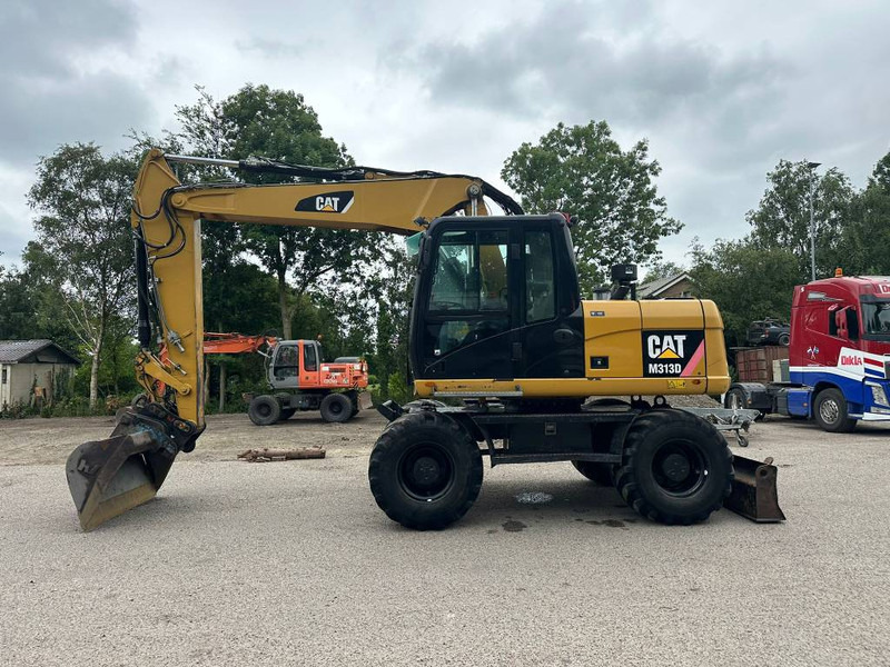 Cat M 313 D - Ekskavator roda: gambar 1 Cat M 313 D - Ekskavator roda: gambar 1