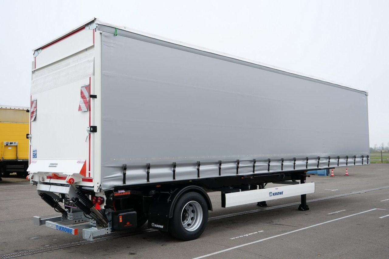 Krone SEP 10 CITY GARDINE KRONE 1-achs TRIDEC LBW Krone SEP 10 CITY GARDINE KRONE 1-achs TRIDEC LBW - Semi-trailer dengan terpal samping: gambar 2 Krone SEP 10 CITY GARDINE KRONE 1-achs TRIDEC LBW Krone SEP 10 CITY GARDINE KRONE 1-achs TRIDEC LBW - Semi-trailer dengan terpal samping: gambar 2