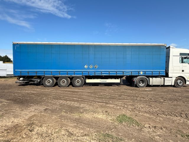 Krone SD mit Faltbare Ladebordwand - Semi-trailer dengan terpal samping: gambar 3 Krone SD mit Faltbare Ladebordwand - Semi-trailer dengan terpal samping: gambar 3