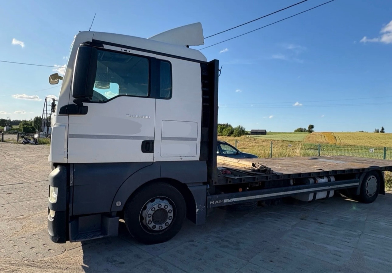MAN TGX 18.400 / PLATFORMA / 630 TYŚ KM / 2015 ROK / SYPIALKA - Truk flatbed: gambar 2 MAN TGX 18.400 / PLATFORMA / 630 TYŚ KM / 2015 ROK / SYPIALKA - Truk flatbed: gambar 2