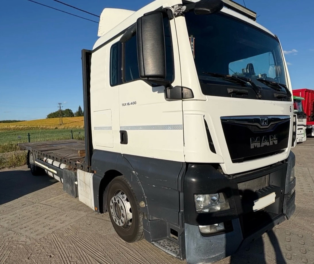 MAN TGX 18.400 / PLATFORMA / 630 TYŚ KM / 2015 ROK / SYPIALKA - Truk flatbed: gambar 1 MAN TGX 18.400 / PLATFORMA / 630 TYŚ KM / 2015 ROK / SYPIALKA - Truk flatbed: gambar 1