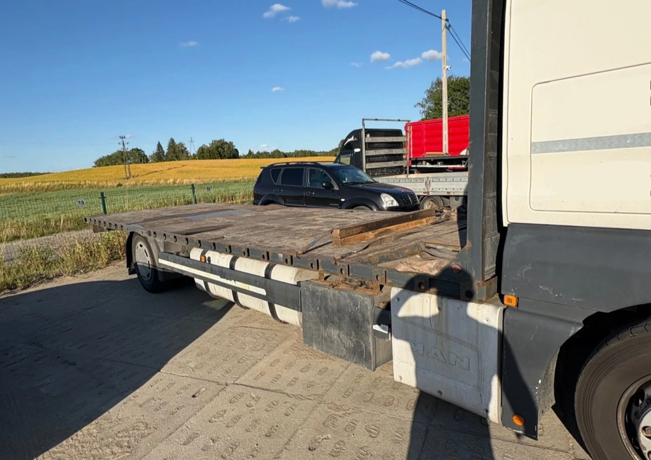 MAN TGX 18.400 / PLATFORMA / 630 TYŚ KM / 2015 ROK / SYPIALKA - Truk flatbed: gambar 4 MAN TGX 18.400 / PLATFORMA / 630 TYŚ KM / 2015 ROK / SYPIALKA - Truk flatbed: gambar 4