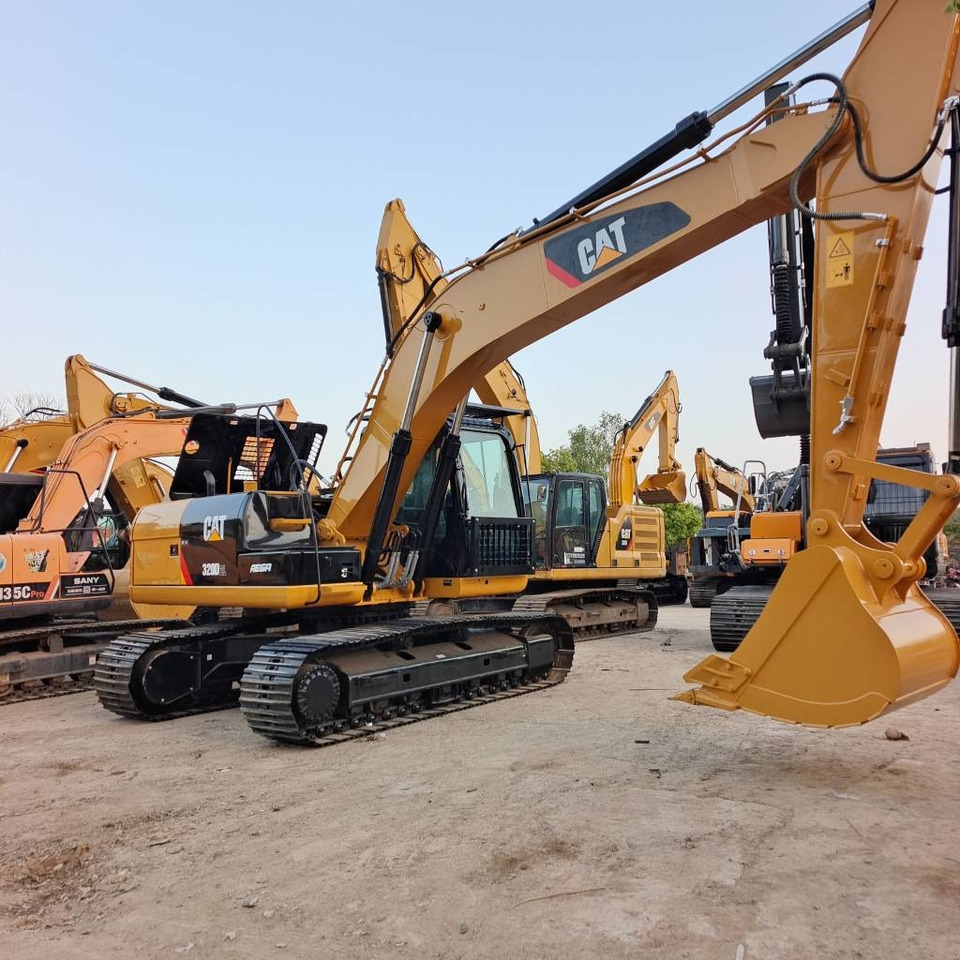 CAT 320D2L - Ekskavator perayap: gambar 1 CAT 320D2L - Ekskavator perayap: gambar 1