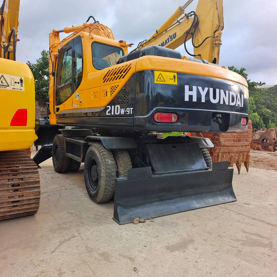 Hyundai 210W-9 - Ekskavator roda: gambar 1 Hyundai 210W-9 - Ekskavator roda: gambar 1