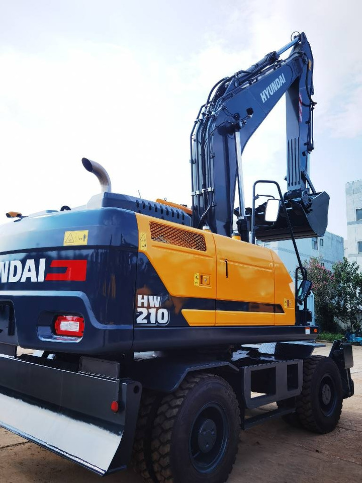 Hyundai 210W-9 - Ekskavator roda: gambar 1 Hyundai 210W-9 - Ekskavator roda: gambar 1