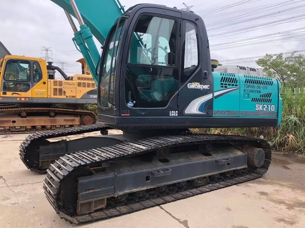 Ekskavator perayap Kobelco SK 210: gambar 12