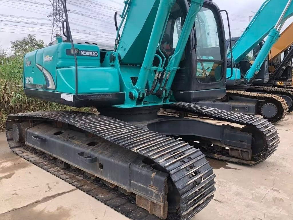 Ekskavator perayap Kobelco SK 210: gambar 9