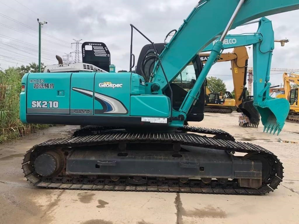 Ekskavator perayap Kobelco SK 210: gambar 10