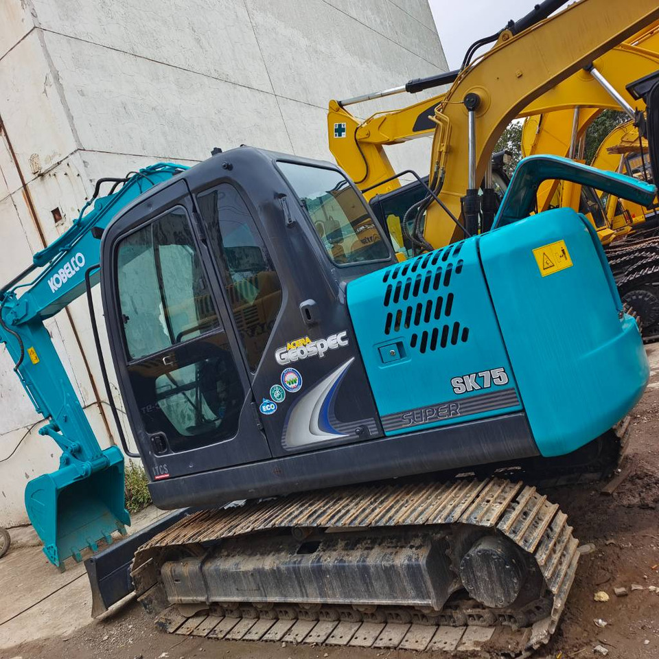 Kobelco SK 75 - Ekskavator mini: gambar 1 Kobelco SK 75 - Ekskavator mini: gambar 1