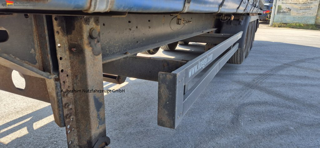 Kögel SN24 Standard, Edscha, Trommelbremse - Semi-trailer dengan terpal samping: gambar 4 Kögel SN24 Standard, Edscha, Trommelbremse - Semi-trailer dengan terpal samping: gambar 4