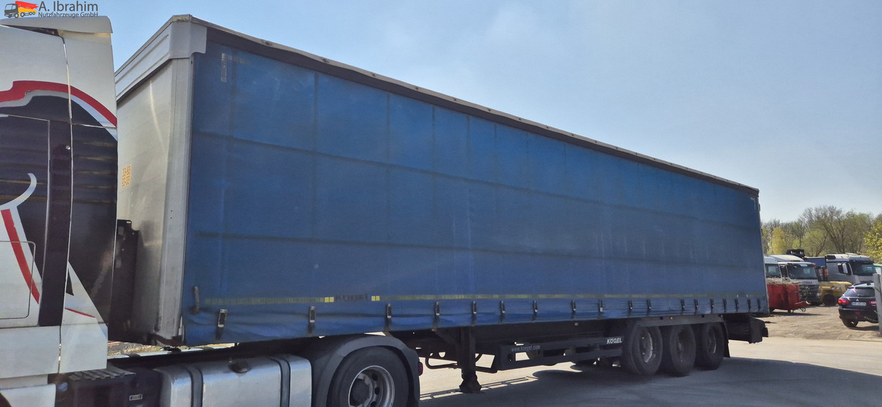 Kögel SN24 Standard, Edscha, Trommelbremse - Semi-trailer dengan terpal samping: gambar 1 Kögel SN24 Standard, Edscha, Trommelbremse - Semi-trailer dengan terpal samping: gambar 1