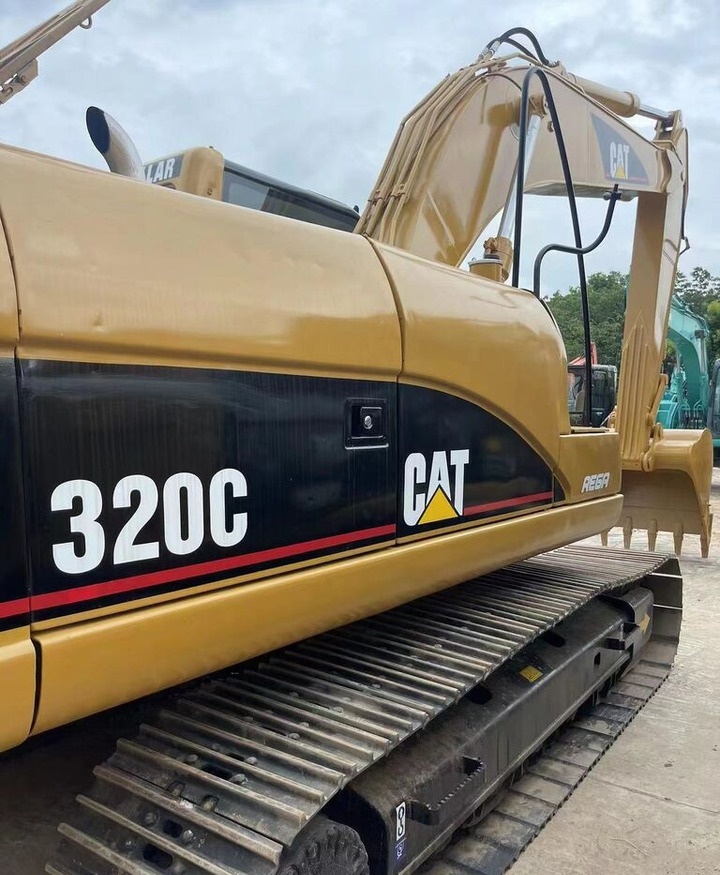 Caterpillar 320C - Ekskavator perayap: gambar 1 Caterpillar 320C - Ekskavator perayap: gambar 1