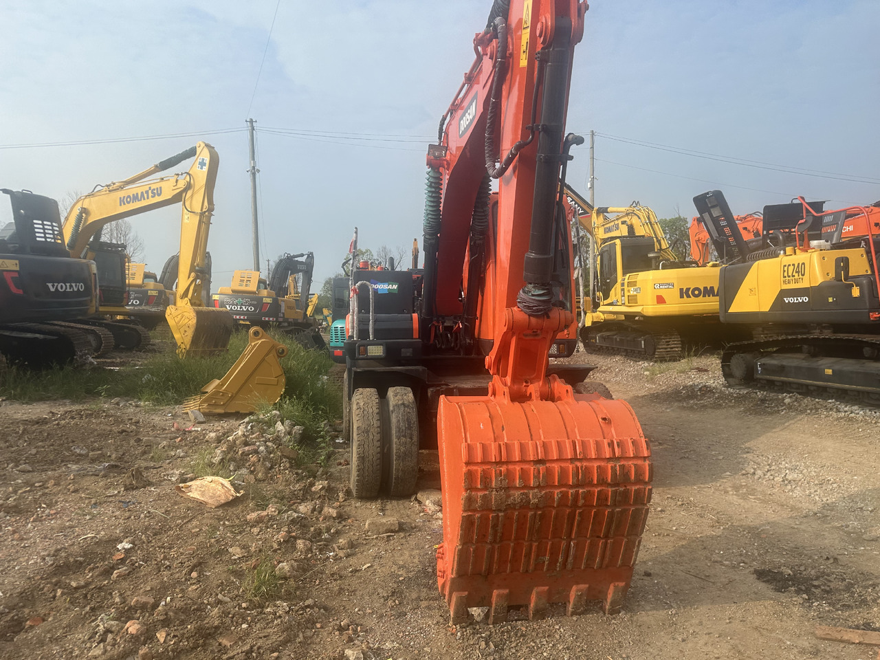 Doosan DX150W-9C - Ekskavator roda: gambar 3 Doosan DX150W-9C - Ekskavator roda: gambar 3