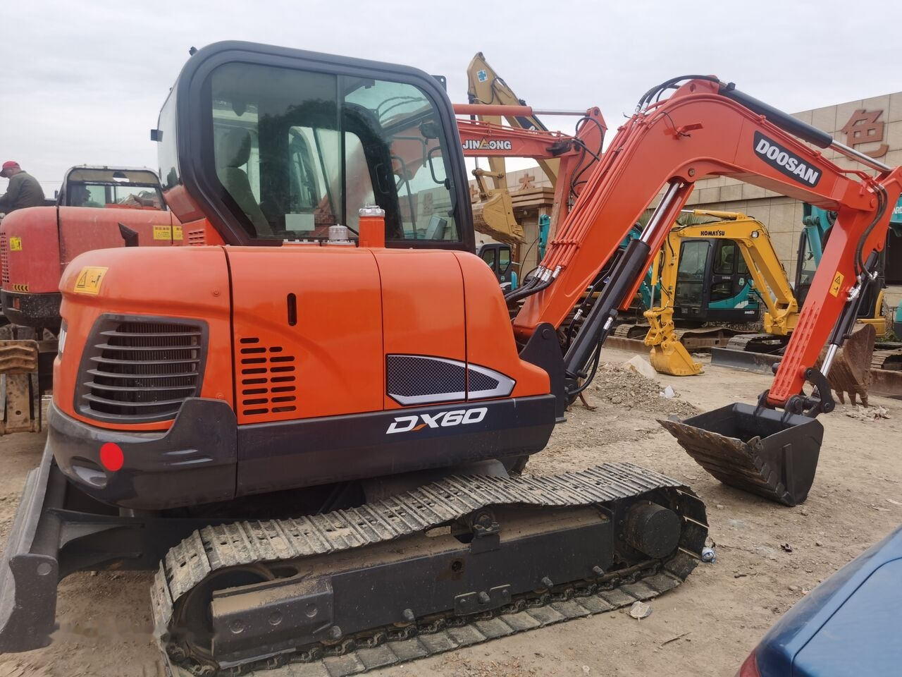 Ekskavator perayap Doosan DX60: gambar 6 Ekskavator perayap Doosan DX60: gambar 6