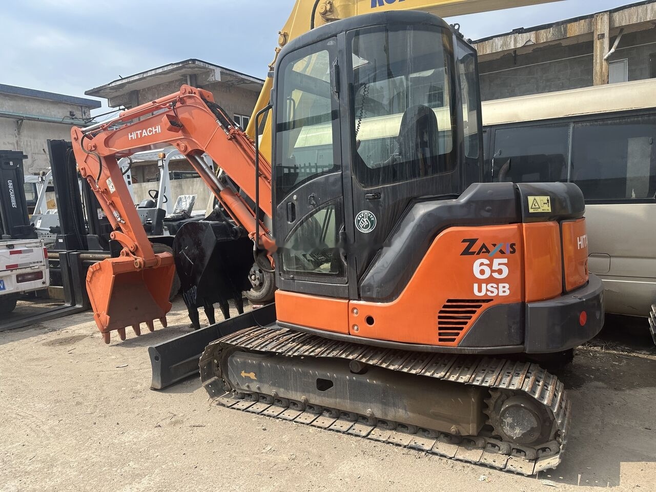 Hitachi ZX65 - Ekskavator mini: gambar 5 Hitachi ZX65 - Ekskavator mini: gambar 5