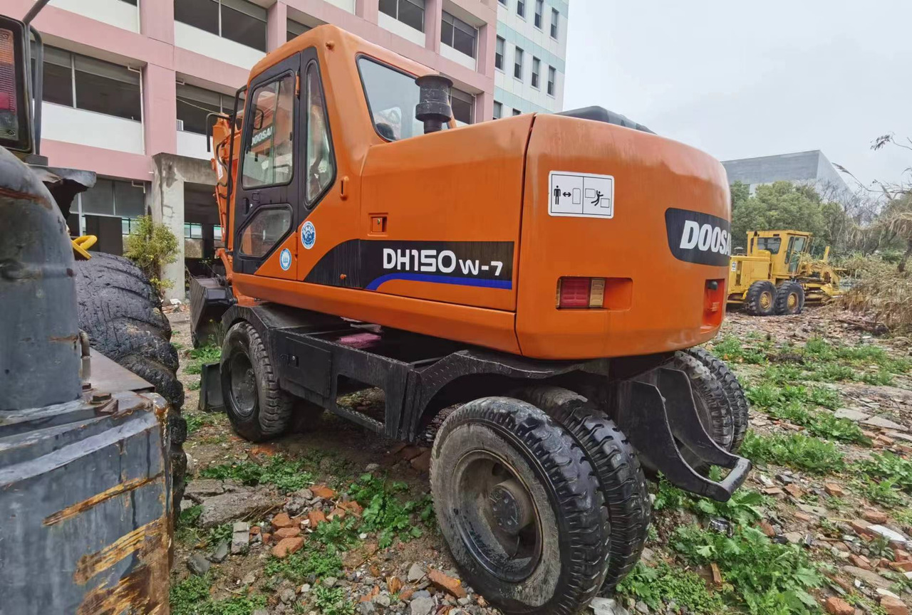 DOOSAN DH150W-7 - Ekskavator roda: gambar 5 DOOSAN DH150W-7 - Ekskavator roda: gambar 5