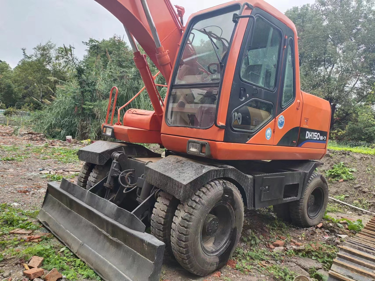 DOOSAN DH150W-7 - Ekskavator roda: gambar 3 DOOSAN DH150W-7 - Ekskavator roda: gambar 3