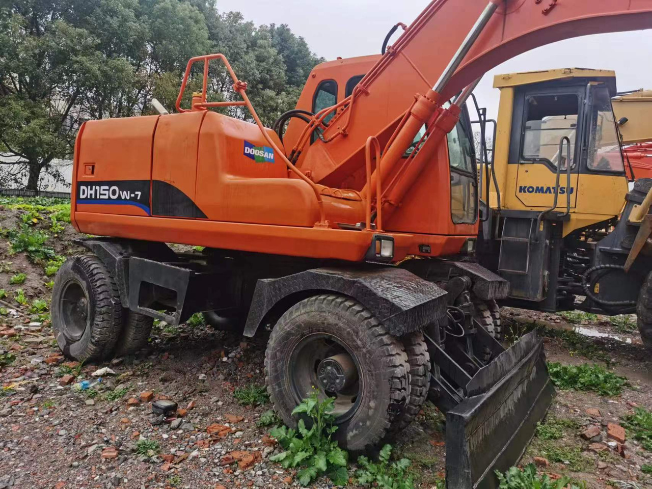 DOOSAN DH150W-7 - Ekskavator roda: gambar 4 DOOSAN DH150W-7 - Ekskavator roda: gambar 4